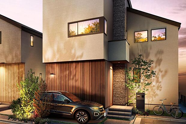 板目の濃淡が美しい木調の外壁で統一したファサードには、季節ごとに表情が変化する植栽を計画的に配置。