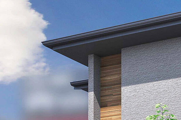 【【軒を出し存在感を高めた屋根デザイン】】深く張り出した軒が立体感のある表情を生み、建物に上質な存在感をプラス。日差しを受けて生まれる陰影が、重厚で洗練された景観を演出します。