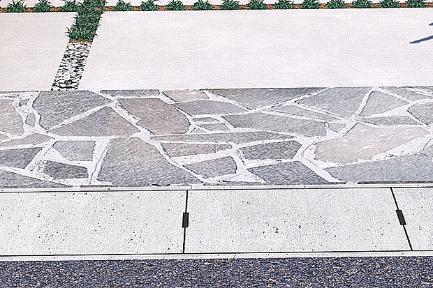 【【天然石敷】】自然の風合いが感じられる天然石の自然素材を外構部分に設えました。外観デザインや植栽と調和し、品格のある街並みを演出します。