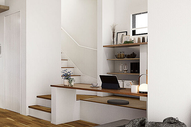 【【スキップDEN】】リビングから段差を設けた、多目的な用途に活躍するスキップDEN。キッチンやリビングの家族とほど良い距離感を保ちながら、勉強や趣味、作業などに利用できる便利な空間です。※号棟により採用状況が異なります。