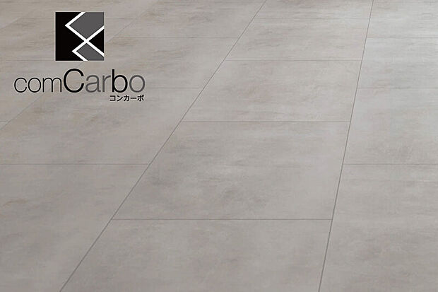 【【コンカーボ】】左官のコテ跡を模した意匠が、独特の風合いを漂わせる非木質意匠のフローリングです。※キッチンの一部に使用。※カラーは号棟により異なります。※画像はイメージです。