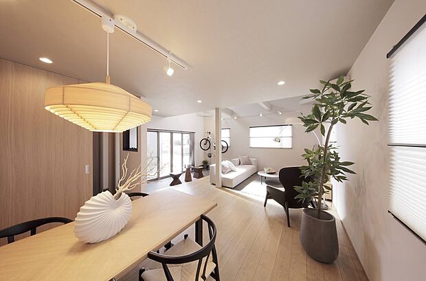 6号地 モデルハウス室内写真。吹抜けから入る光と開放感、室内土間空間の使い方の多様性が、ここでの生活の想像を刺激してくれます。