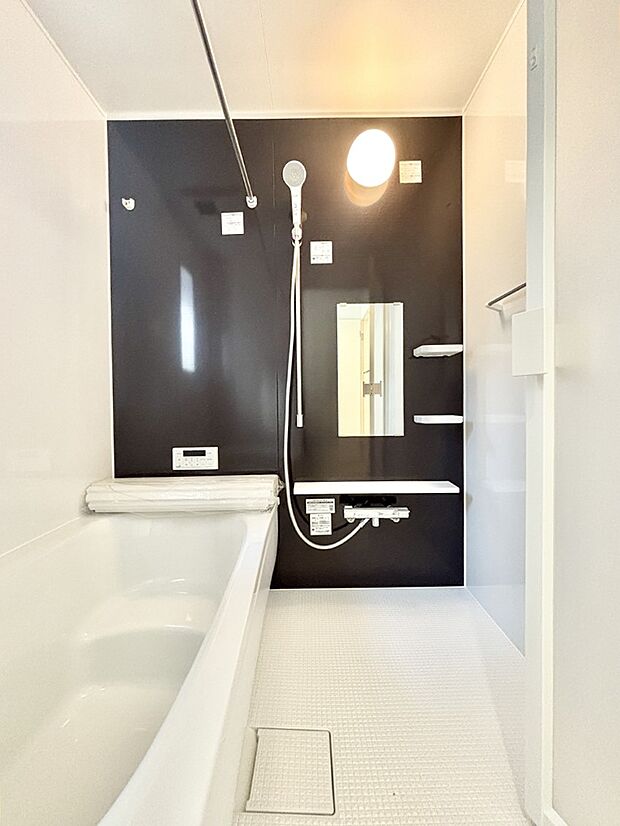 落ち着いた雰囲気でゆっくりお寛ぎいただけるバスルーム