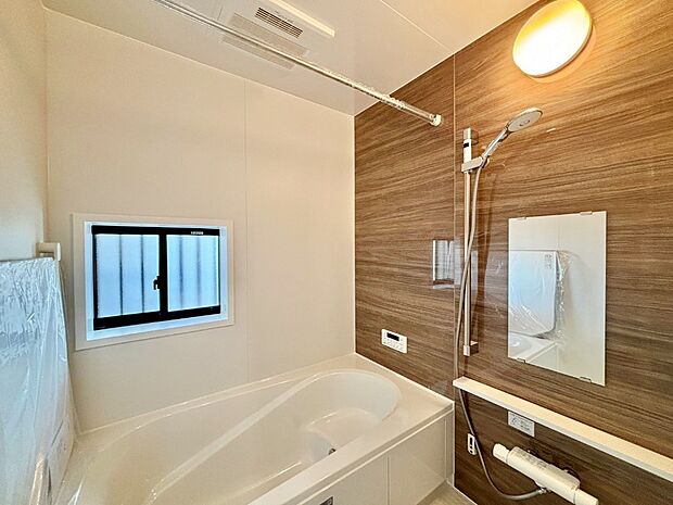 落ち着いた雰囲気でゆっくりお寛ぎいただけるバスルーム