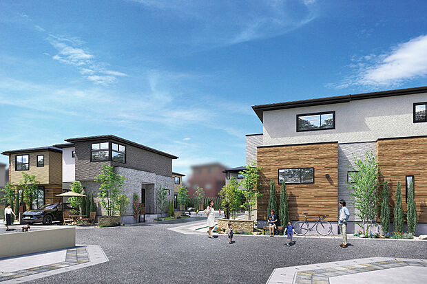 【【心躍る暮らしを育む、全16邸のビッグタウン】】モダンなシルエットに木目調と石積調のデザイン性高い外壁が、街に一体感を持たせながらも遊び心をくすぐります。