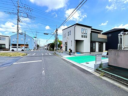 【1号棟　前面道路を含む現地写真】