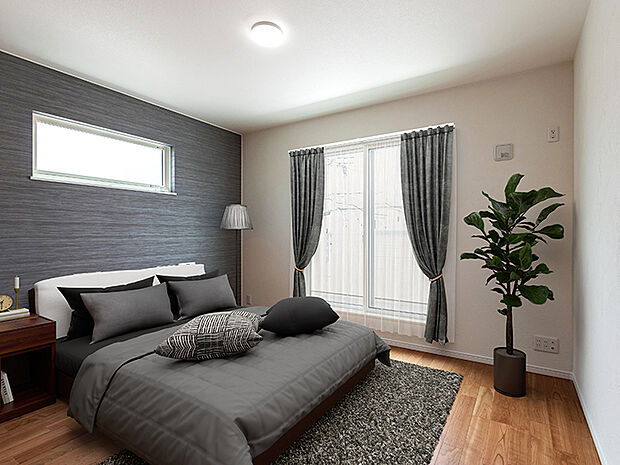 【主寝室施工例　ブランピュール栗平　7号棟＋CG家具】たっぷりと陽ざしの降り注ぐ室内は、ゆとりの大きさがあり寛げます。主寝室用の大きなウォークインクローゼットも魅力的。建具は木目を生かした自然な風合いで、アクセントクロスが洗練された空間を見事に演出。