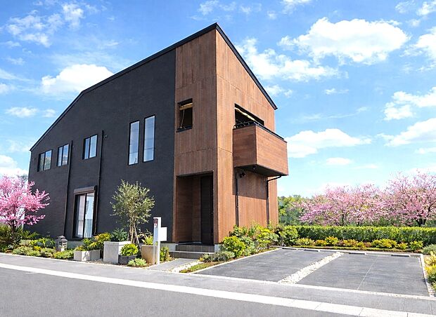外観（施工例）施工例　レオ・オートクチュール住宅　自由設計 建物価格1540万円、建物面積92.74m2　木の温もりと黒の重厚感が調和する、街並みに映えるモダン邸宅。