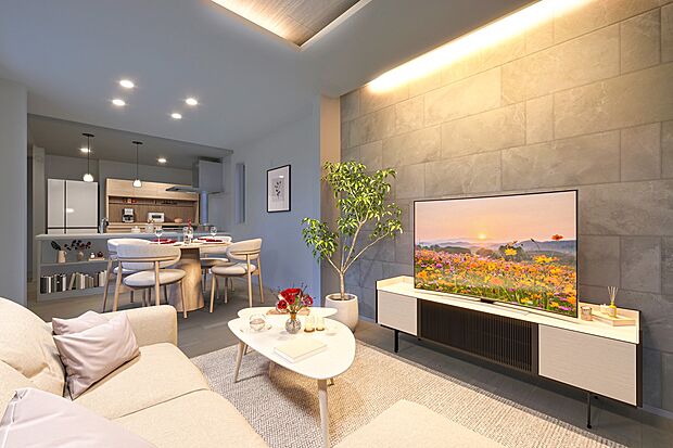 アクセントウォールの質感を際立たせる間接照明が印象的。家族でゆったりとした夜を過ごせそうです。(3号棟※建物は現物となります。生活イメージの喚起のために家具を合成しております。)