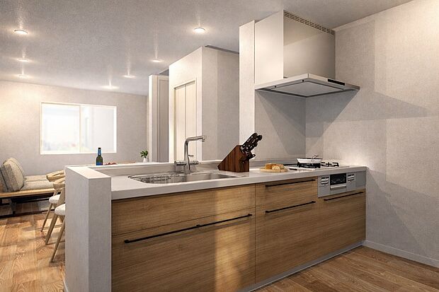 【【ドリームタウンシリーズ施工例:キッチン】】リビングを見渡すことができる対面キッキンは、家事をしていても家族の様子が見えて安心感があります。ワイドなスペースなので2人並んで一緒にお料理もできちゃいます!