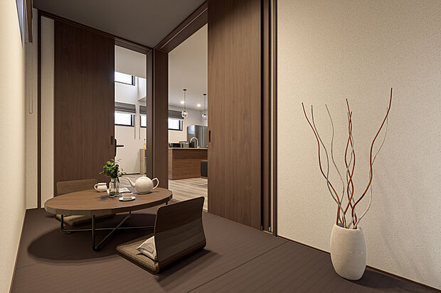 【和室完成予想図】T-3完成予想図／LDK横の和室はシックな栗色のへりなし畳を採用したモダンな空間。扉を開ければお子様の遊び場や昼寝スペースや来客用など多目的に活躍。家族の気配を感じながら、ゆったりと寛げます