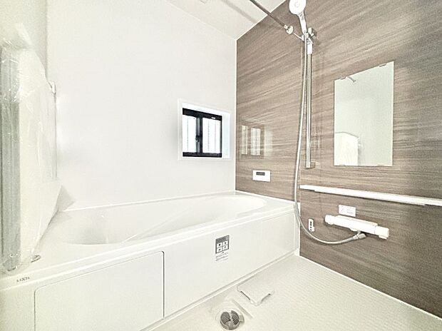 落ち着いた雰囲気でゆっくりお寛ぎいただけるバスルーム