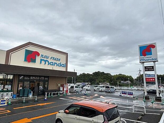 万代河合町店（約1,980m）