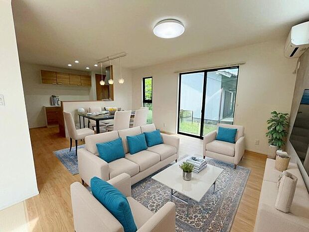 【リビング】 明るい光が差し込む開放感あふれるリビングは、ご家族が自然と集まる憩いの場所となります。 温かい会話が弾む心地よい空間で、日々の暮らしを豊かに彩る特別な時間を過ごせます。