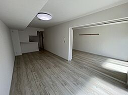 東武伊勢崎線 西新井駅 徒歩11分の賃貸マンション 1階1SLDKのリビング/ダイニング