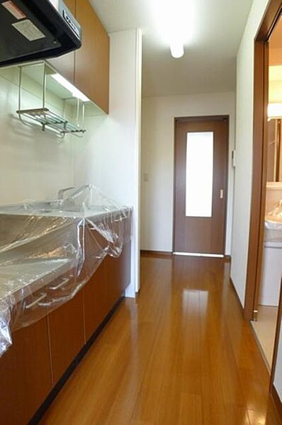 画像10:キッチンスペースは居室とドアで仕切られております。