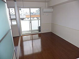 京王線 北野駅 徒歩8分の賃貸アパート 3階1LDKのリビング/ダイニング