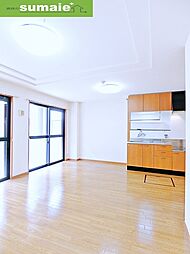 コムス・エルアール 1階1LDKのリビング/ダイニング