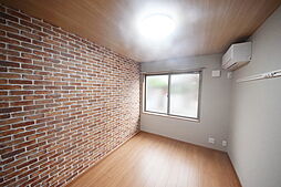 プルミエール多摩大塚 104 1階1Kのリビング/ダイニング