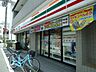 周辺：セブンイレブン豊中蛍池中町店 256m