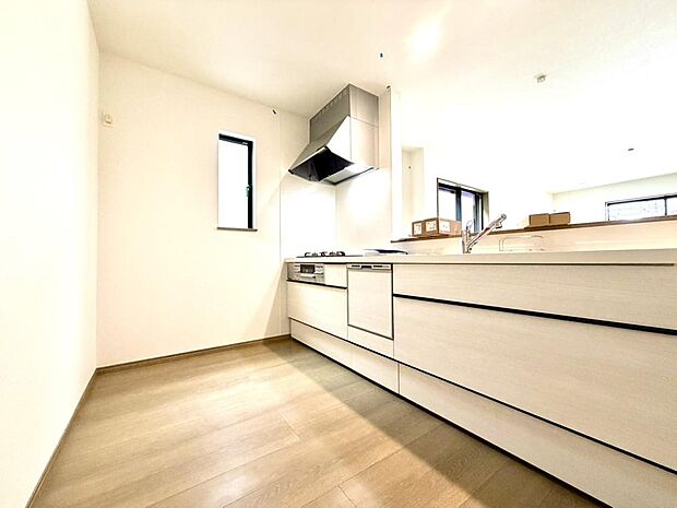 新しいお住まいのキッチンで、休日は家族でお料理を楽しむ時間が増えそうです。