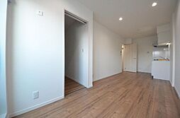 グランシャレー西綾瀬 102 1階1LDKのリビング/ダイニング