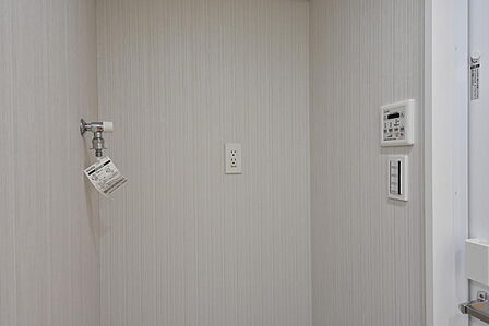 洗濯機用水栓と浴室換気館雄暖房機