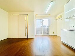 ウィスタリア・ガーデンB 101 1階1LDKのリビング/ダイニング