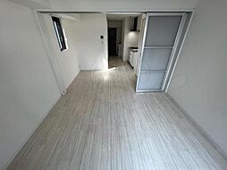 MV.imp大阪塚本 103 1階1DKのリビング/ダイニング