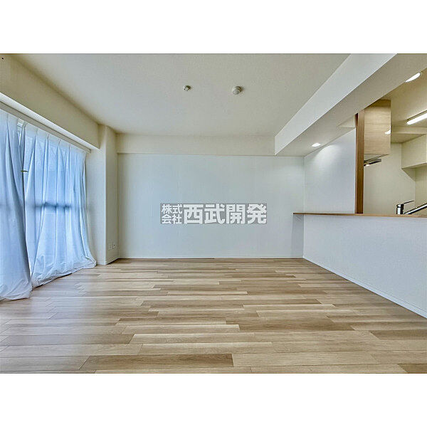 リビング全体が見渡せる対面キッチンは、家事をしながらでも家族との一体感を感じられるのがいいですね。