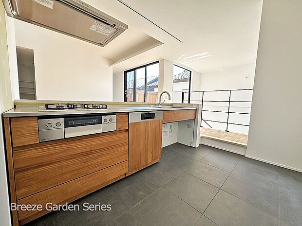 内装:TAISEIこだわりの施工例写真:床はシックな色味のキッチン