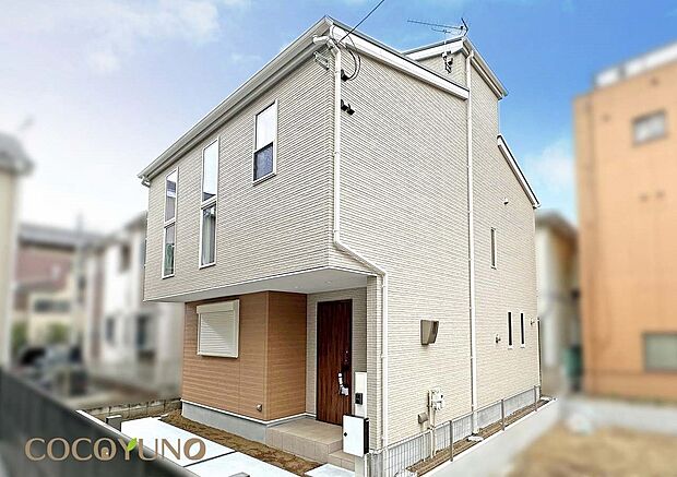 外観:当社施工例:温かみのあるナチュラルカラーで仕上げた外観。