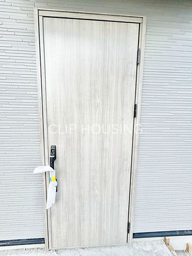 お客様をお迎えする玄関は落ち着いた雰囲気。帰り着くたびに洗練されたテイストです。