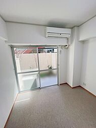 オサダハイツ 102 1階1Kの寝室