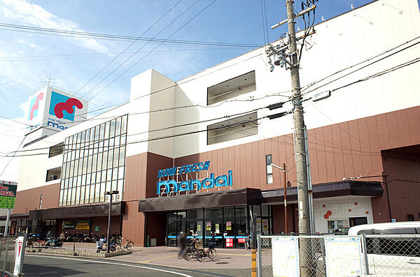 万代尾崎店
