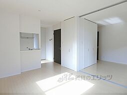 京洛舎二人司 A101 1階1LDKのリビング/ダイニング