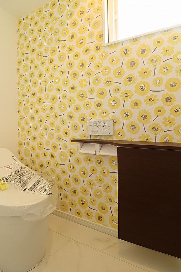 アクセントクロスがとても可愛いトイレ空間