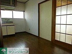 JR青梅線 小作駅 バス14分 藤橋2丁目下車 徒歩1分の賃貸アパート 2階2DKのリビング/ダイニング