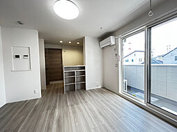 トリシア東口 102 1階1LDKのリビング/ダイニング