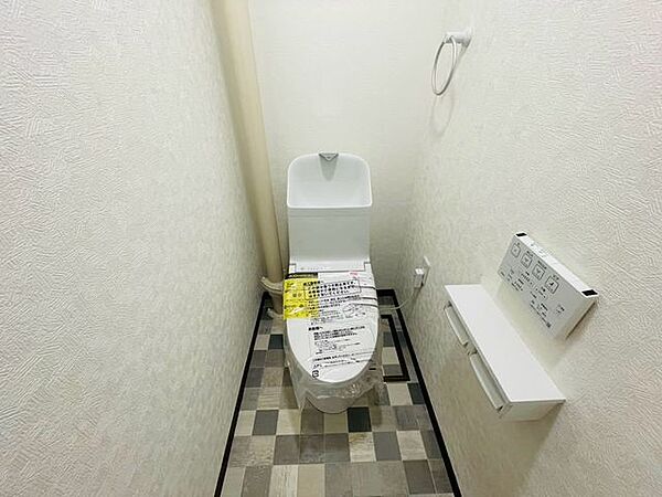 毎日使うトイレは落ち着きと清潔感のあるデザイン