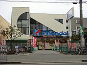 株式会社万代 香里店（1973m）