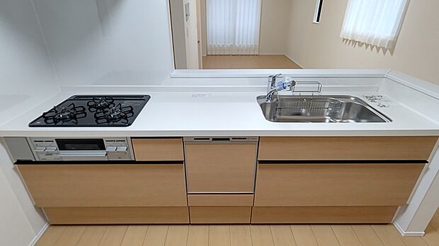 料理をしながらでもご家族との会話を楽しめる対面キッチン。 