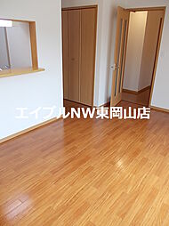 イースト・ユニゾン 1階1LDKのリビング/ダイニング