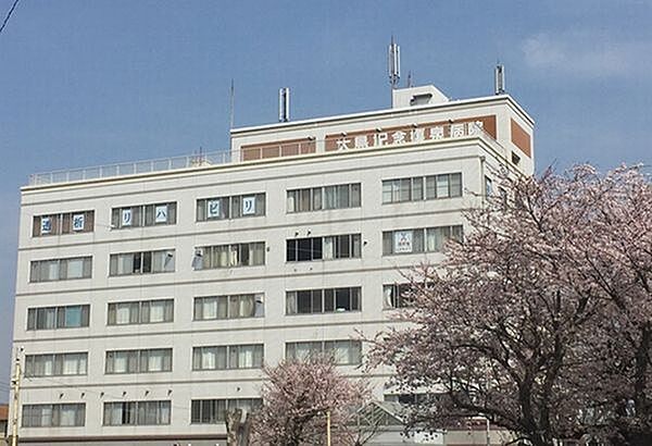 病院「大島記念嬉泉病院まで750m」