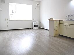 グリューンベーク 102 1階1LDKのリビング/ダイニング