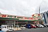 周辺：ワッツウィズ岡輝天満屋ハピーズ店(ショッピングセンター)まで583m