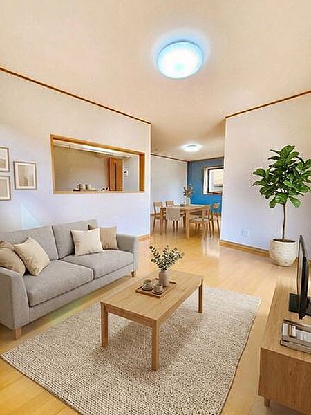 家族が自然と集まる、陽だまりの20.5帖LDK。冬でも足元から暖かい床暖房が、心地よい寛ぎの時間を演出。笑顔と会話が生まれる、我が家の中心となる空間です。【AIでCG加工、家具配置しております】