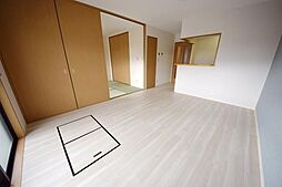 京王線 聖蹟桜ヶ丘駅 徒歩15分の賃貸マンション 1階3LDKのリビング/ダイニング