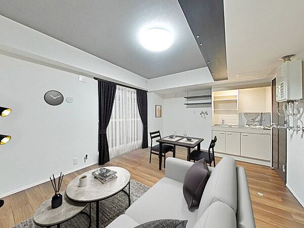 【リフォーム後＿居室】CG合成で家具を配置したイメージです。お部屋の間取はワンルームです。クロス貼替、クッションフロア重張、照明交換、棚造作等リフォームいたしました。