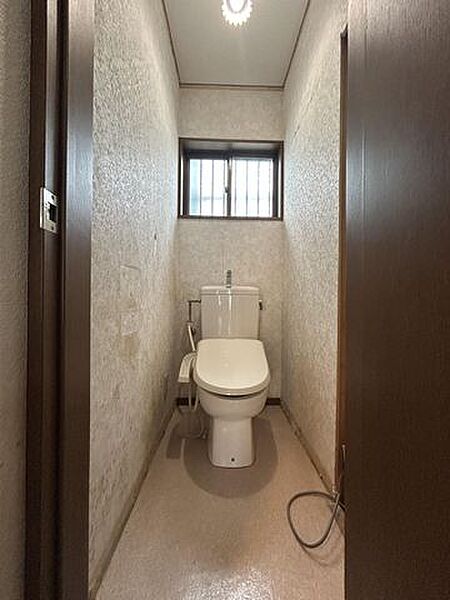 トイレの写真です。新品交換いたします。